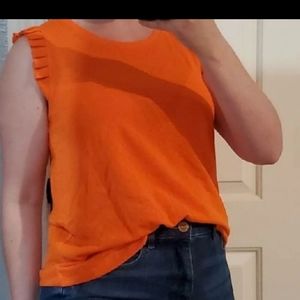 Bright orange top